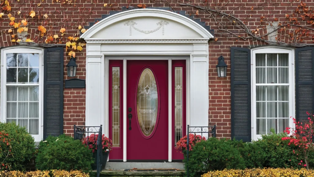 beautiful red fiberglass entry door on cary nc home by kelly window and door on brick house